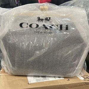 Coach Kiss Lock Brand New with Tags
Ordered from Bloomingdale’s